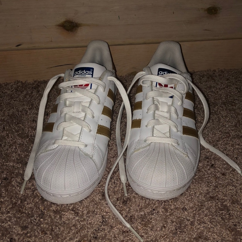 White and Gold Adidas Superstar Shoes